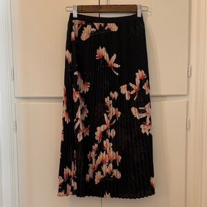 Babaton Black Pleated Midi Skirt with Pink Floral Print